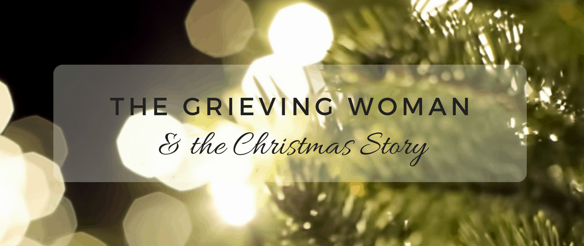 grieving woman title with tree lights